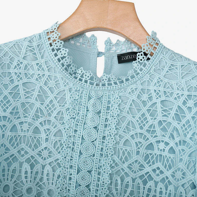 Casual loose hollow-out half puff sleeve top