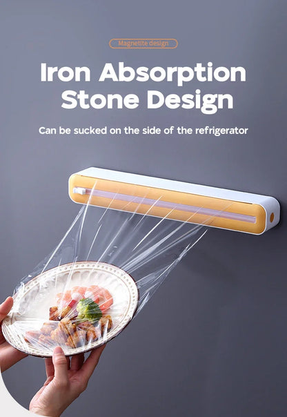 Foil and film storage box with built-in blade