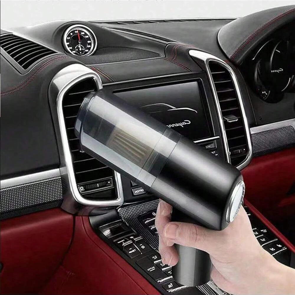 Compact handheld vacuum with suction, blow, and brush functions