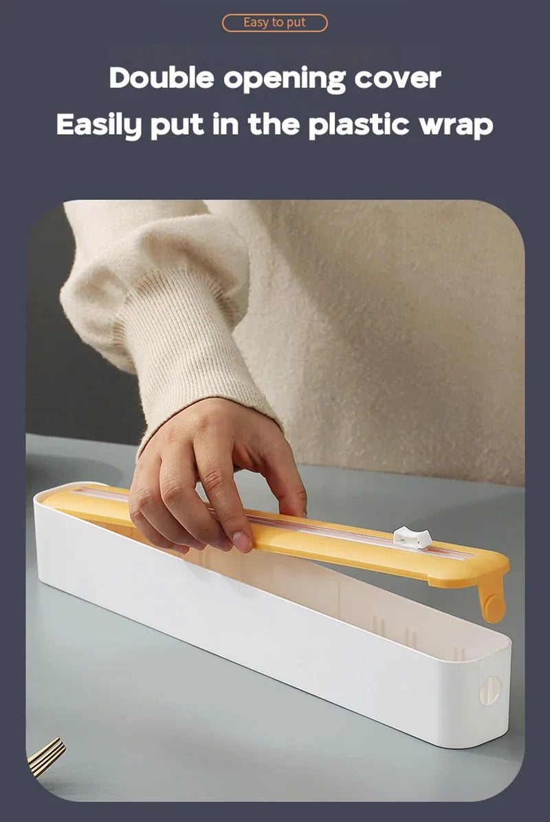 Foil and film storage box with built-in blade