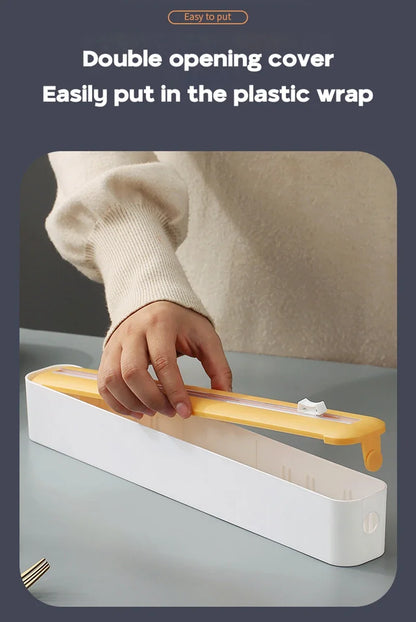 Foil and film storage box with built-in blade