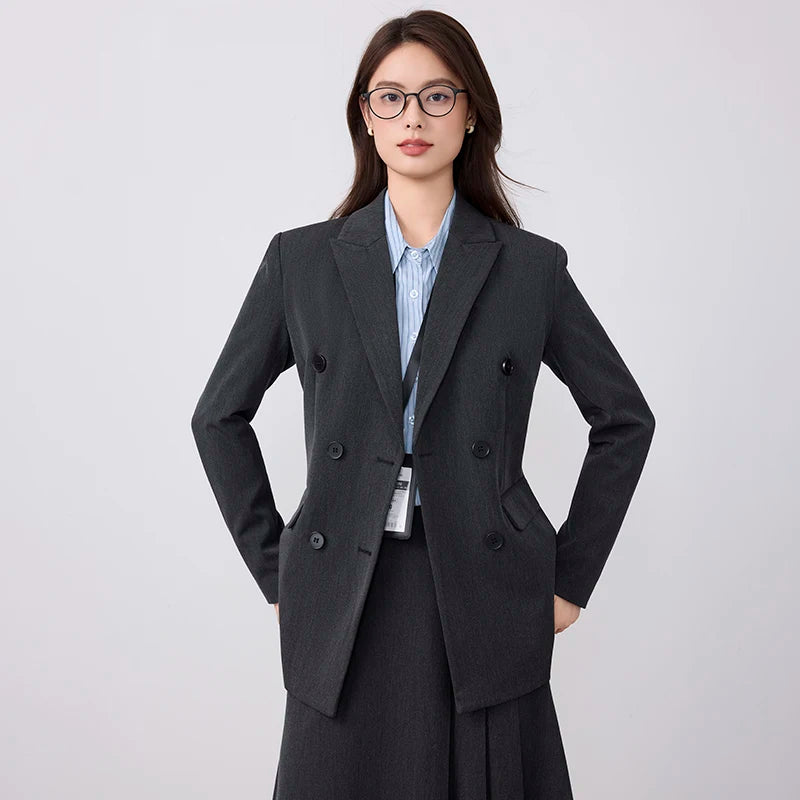 College-style blazer and pleated skirt outfit