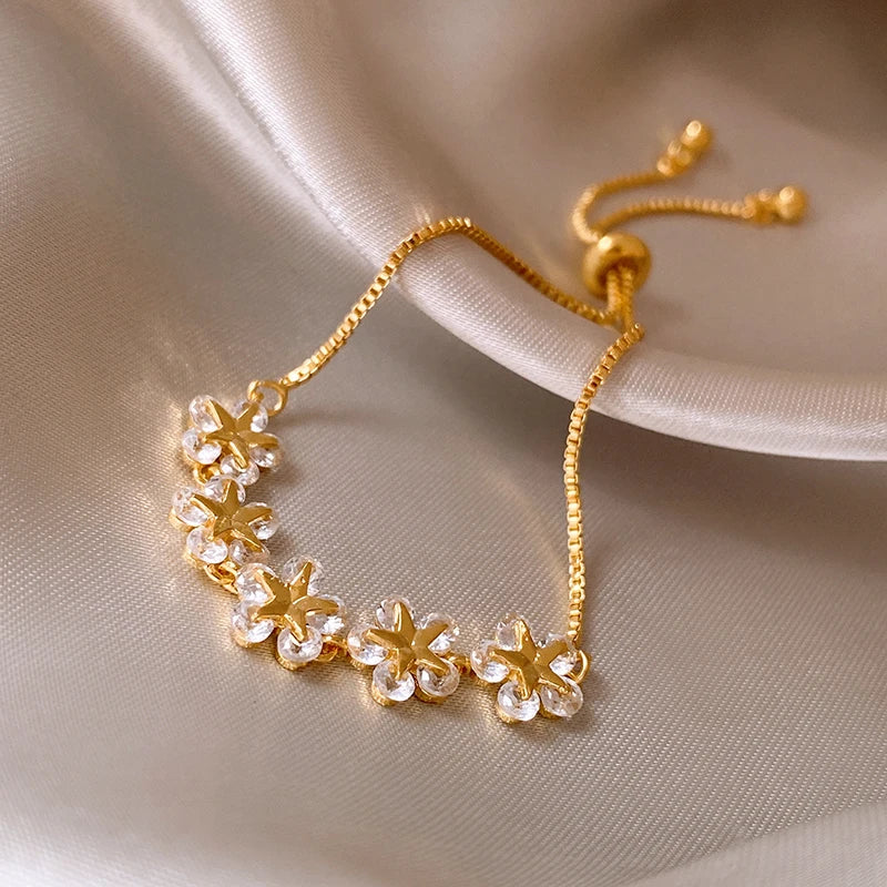 Rhinestone Charm Bracelet – Stars & Flowers, Gold Adjustable Bangle