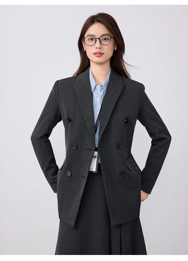 College-style blazer and pleated skirt outfit