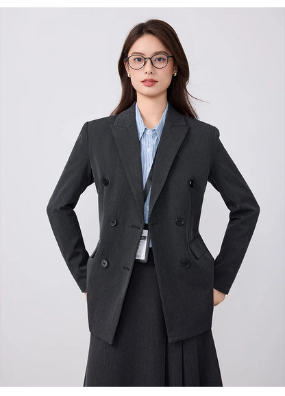College-style blazer and pleated skirt outfit