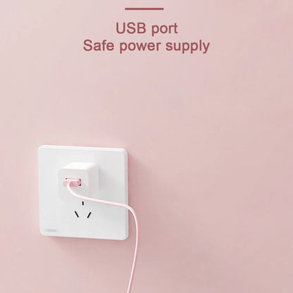 Compact USB beverage warmer with three temperature levels—perfect for hot drinks at your desk