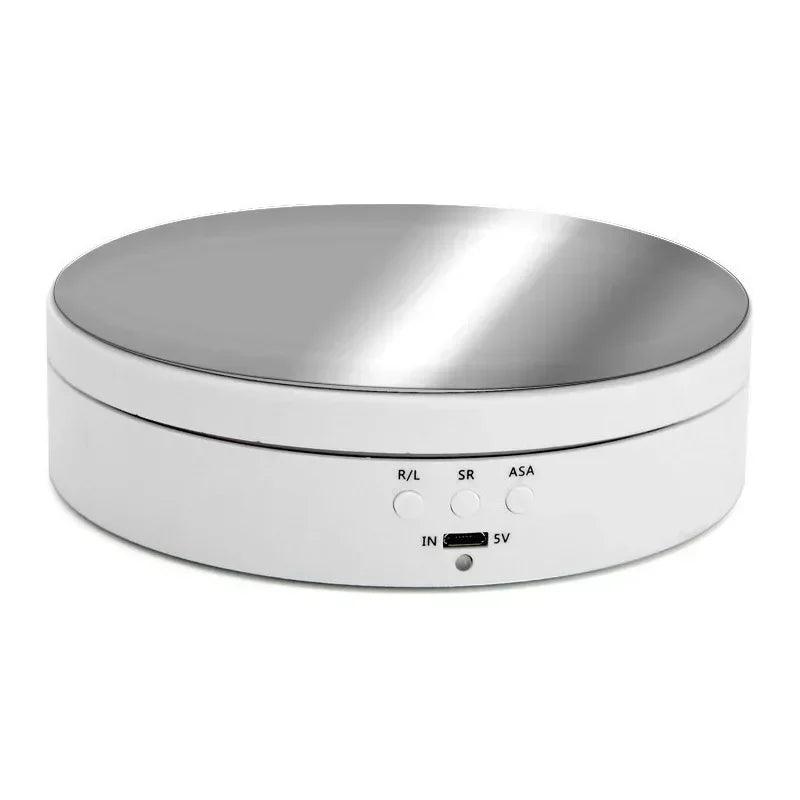 Remote-controlled rotating display for jewelry, collectibles, or video shoots