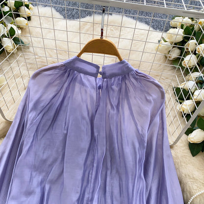 Elegant solid-color women’s blouse for everyday wear