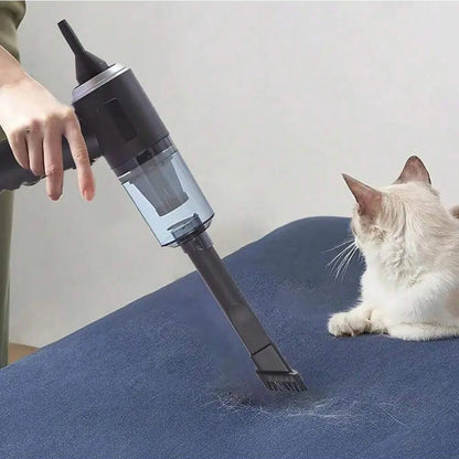 Compact handheld vacuum with suction, blow, and brush functions