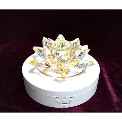 Remote-controlled rotating display for jewelry, collectibles, or video shoots