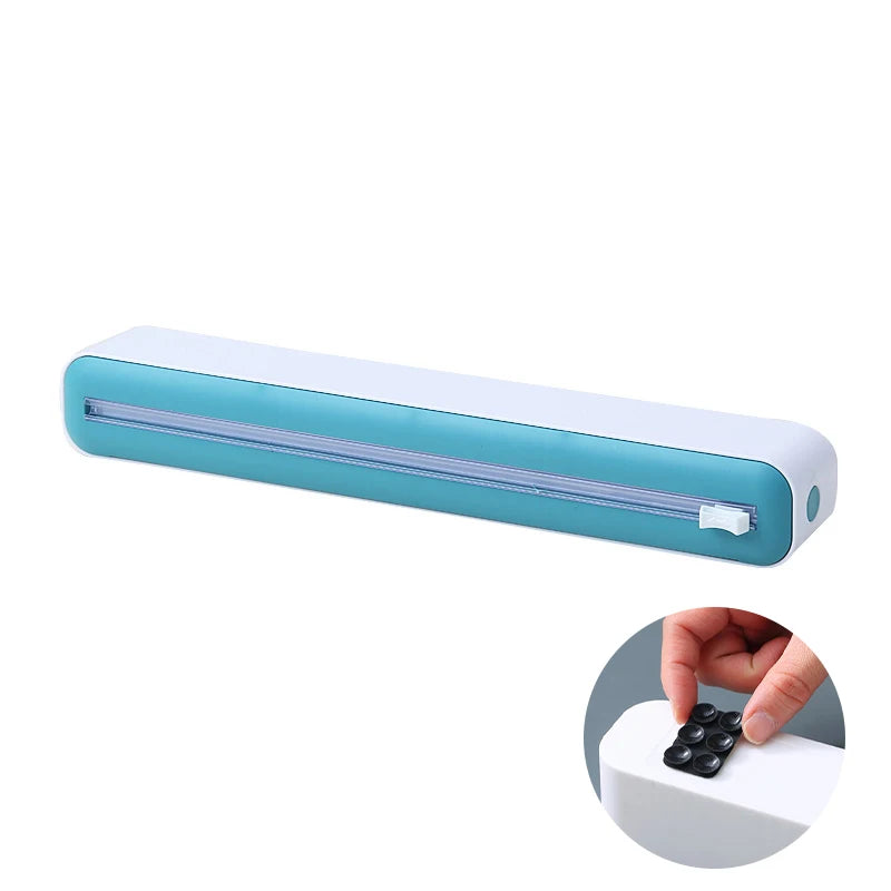 Foil and film storage box with built-in blade