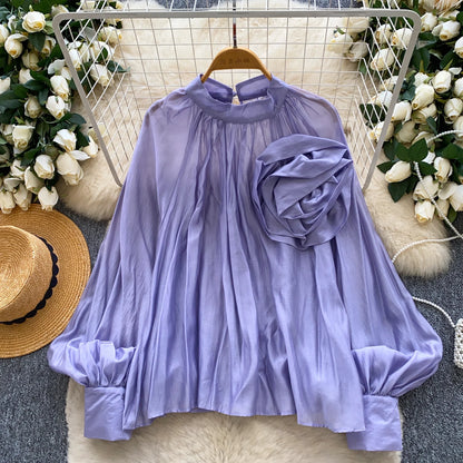 Elegant solid-color women’s blouse for everyday wear