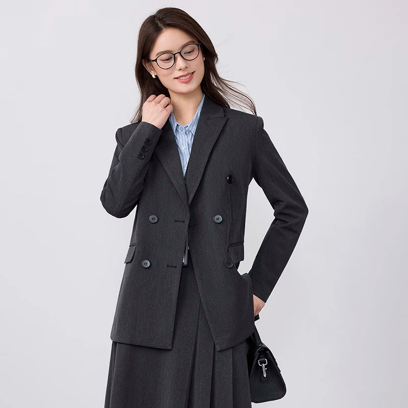 College-style blazer and pleated skirt outfit