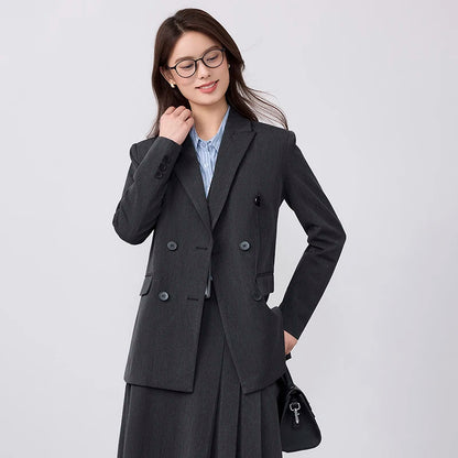 College-style blazer and pleated skirt outfit