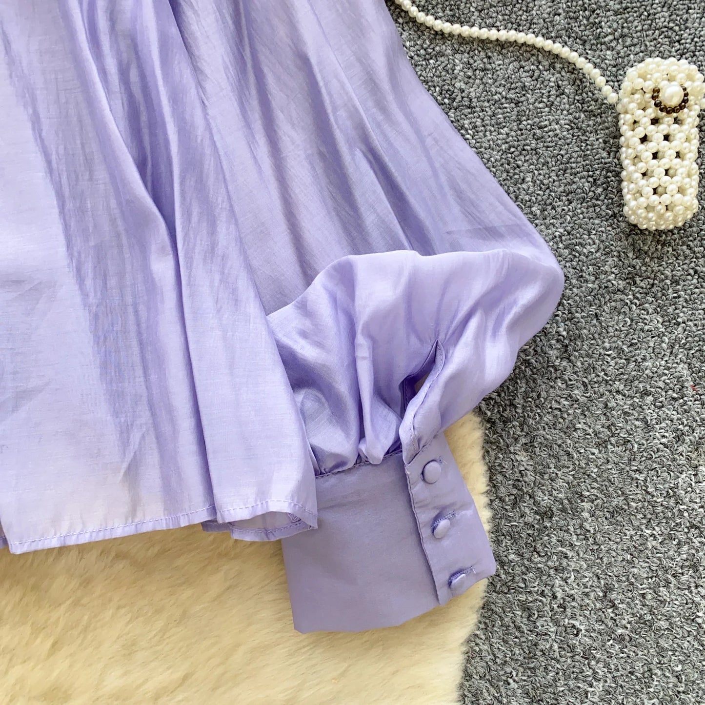 Elegant solid-color women’s blouse for everyday wear