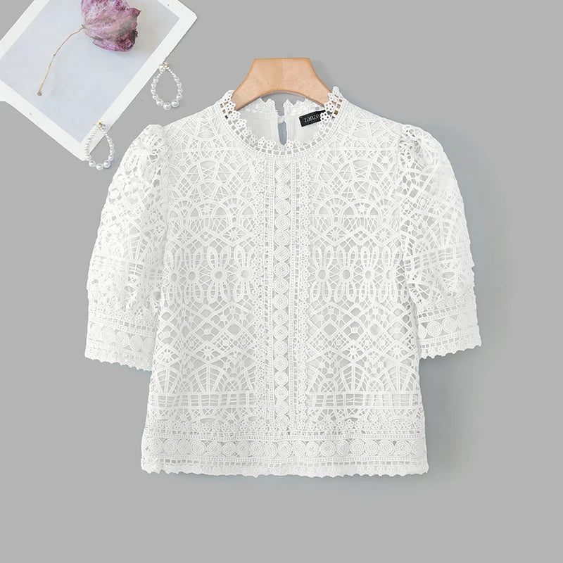 Casual loose hollow-out half puff sleeve top