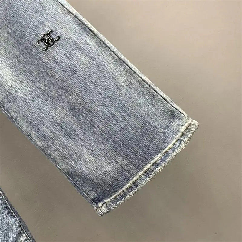Loose straight-leg floor-length jeans with letter embroidery