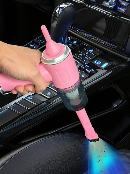 Compact handheld vacuum with suction, blow, and brush functions