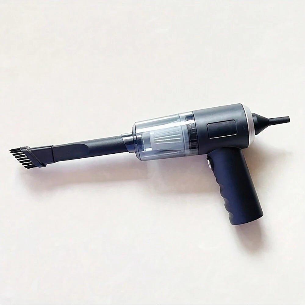 Compact handheld vacuum with suction, blow, and brush functions