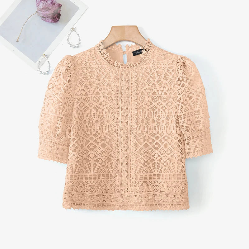 Casual loose hollow-out half puff sleeve top