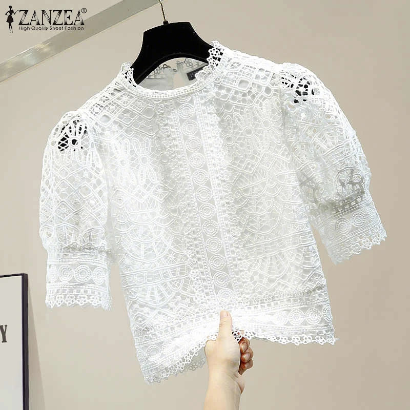 Casual loose hollow-out half puff sleeve top