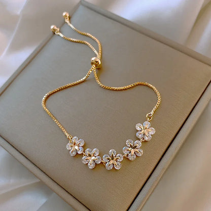 Rhinestone Charm Bracelet – Stars & Flowers, Gold Adjustable Bangle