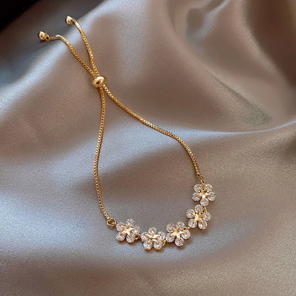 Rhinestone Charm Bracelet – Stars & Flowers, Gold Adjustable Bangle
